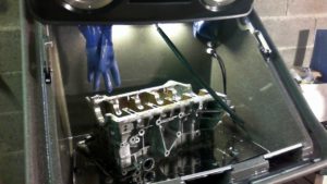 Cleaning BMW header in Torrent 500 parts cleaning machine